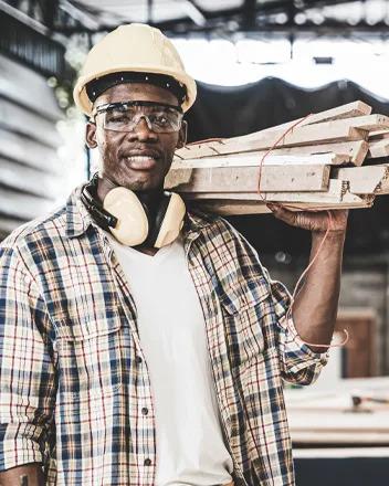 contractors going over a blueprint on public school project